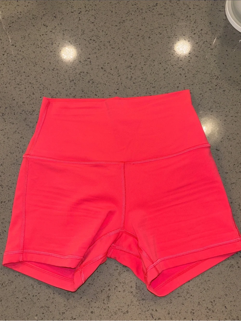 Women's High-Rise Bike Shorts in Coral Pink